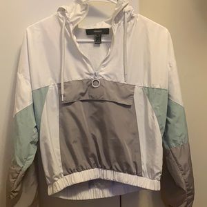 Cropped colored white, sea-green, gray jacket.